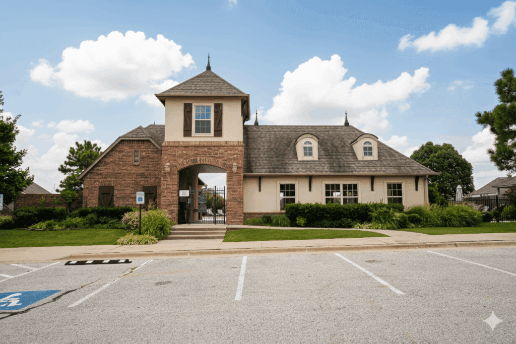 Elegant clubhouse at Seven Oaks South neighborhood in Broken Arrow, Oklahoma, featuring classic architecture and landscaped surroundings.