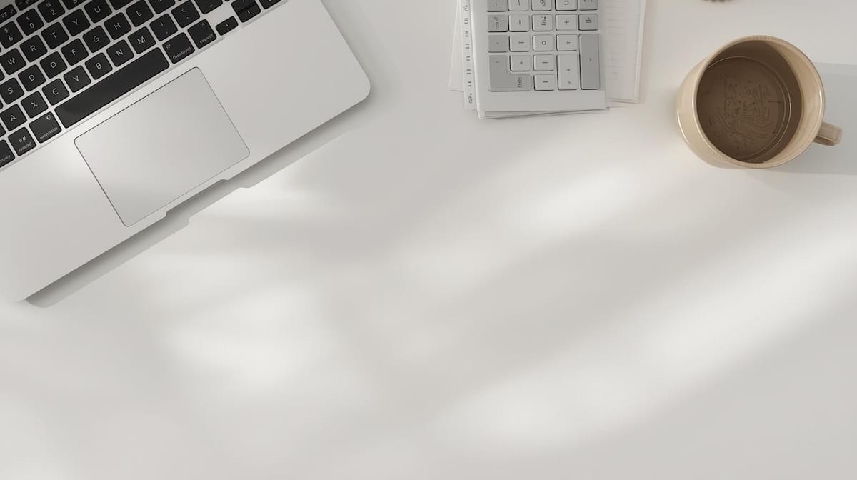 Home buying commandments emphasizing financial stability during escrow with organized desk and documents