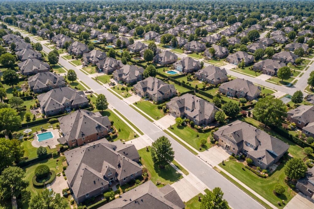 Aerial view of Tulsa-area neighborhood showing location impact on home sales