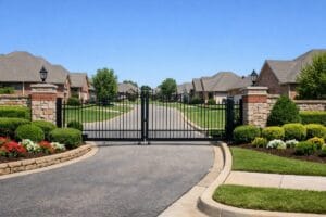 Gated entrance to Magnolia Gardens at Battle Creek Broken Arrow OK with brick homes and landscaped entry
